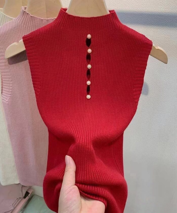 59ffe287 101c 4244 ae52 0ce1adf7fb26 November 21st, 2024 https://fusionwear.net High-necked Decorative Button Sleeveless Knitwear Sexy Hot Girl Suit Base Vest Sweater Women